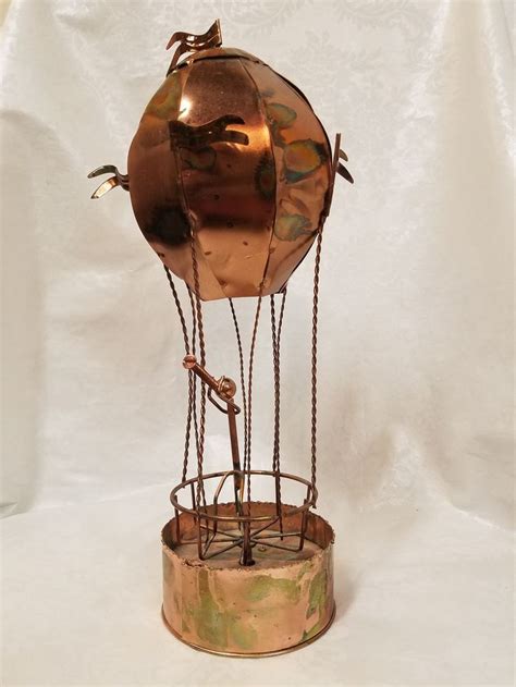 yip made in hong kong metal music box|Vintage YIP Metal Copper Hot Air Balloon Rotating Musical .